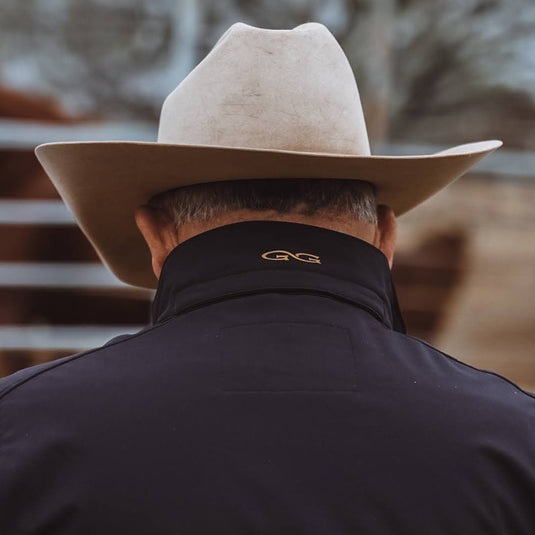 Man wearing Guia Grande Caviar Jacket and cowboy hat
